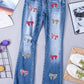 Sequin Bow Distressed Bootcut Jeans - NawdeX